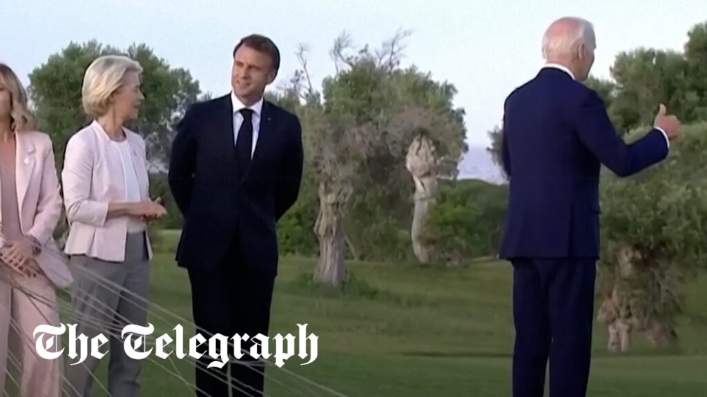 Joe Biden appears to wander off during G7 ceremony